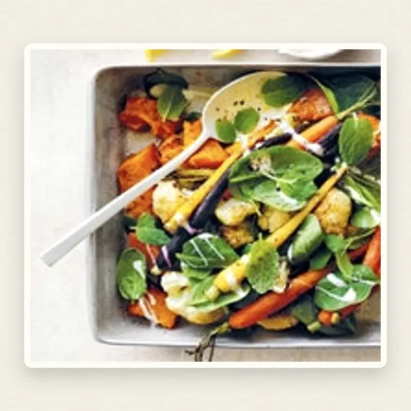 Honey-Roasted Vegetable Salad plated on an off-white linen surface